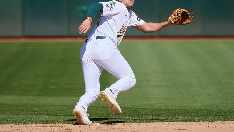 Sep 24, 2023; Oakland, California, USA; Oakland Athletics infielder Kevin Smith (4) against the Detroit Tigers during the eighth inning at Oakland-Alameda County Coliseum. Mandatory Credit: Robert Edwards-USA TODAY Sports