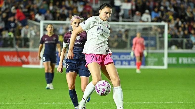 Oct 7, 2023; Cary, North Carolina, USA; San Diego Wave FC midfielder Taylor Kornieck (22) controls the ball against North Carolina Courage midfielder Denise O'Sullivan (10) during the second half at WakeMed Soccer Park. Mandatory Credit: Rob Kinnan-USA TODAY Sports