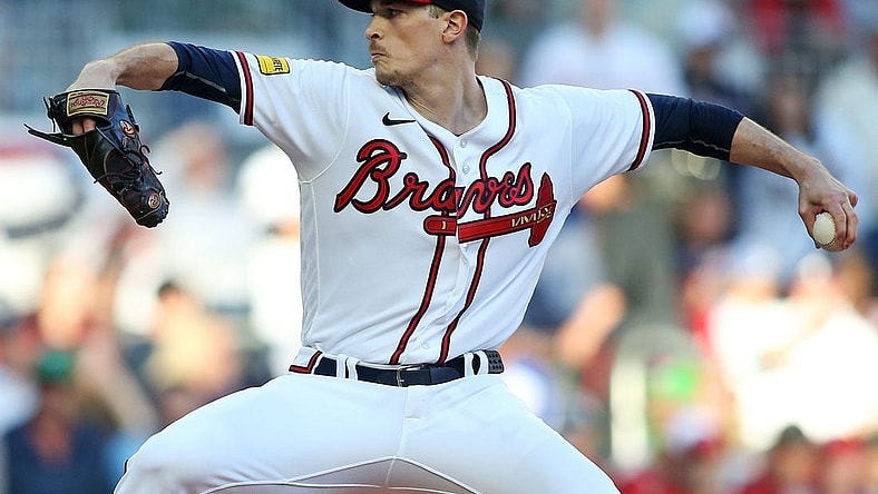 Oct 9, 2023; Cumberland, Georgia, USA; Atlanta Braves starting pitcher Max Fried (54) pitches during the first inning against the Philadelphia Phillies in game two of the NLDS for the 2023 MLB playoffs at Truist Park. Mandatory Credit: Brett Davis-USA TODAY Sports