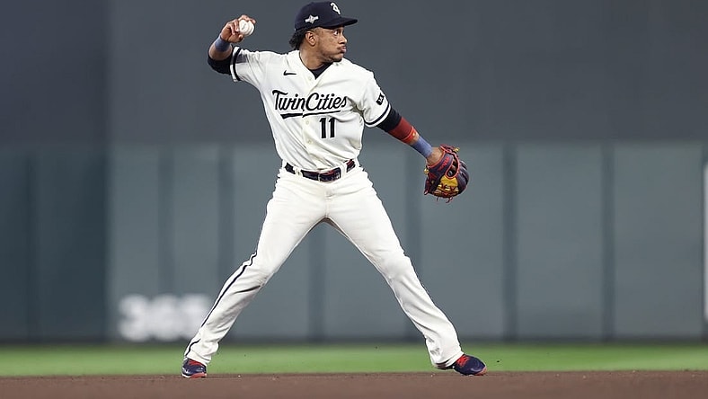 Oct 11, 2023; Minneapolis, Minnesota, USA; Minnesota Twins second baseman Jorge Polanco (11) throws to first for an out in the eighth inning against the Houston Astros during game four of the ALDS for the 2023 MLB playoffs at Target Field. Mandatory Credit: Jesse Johnson-USA TODAY Sports