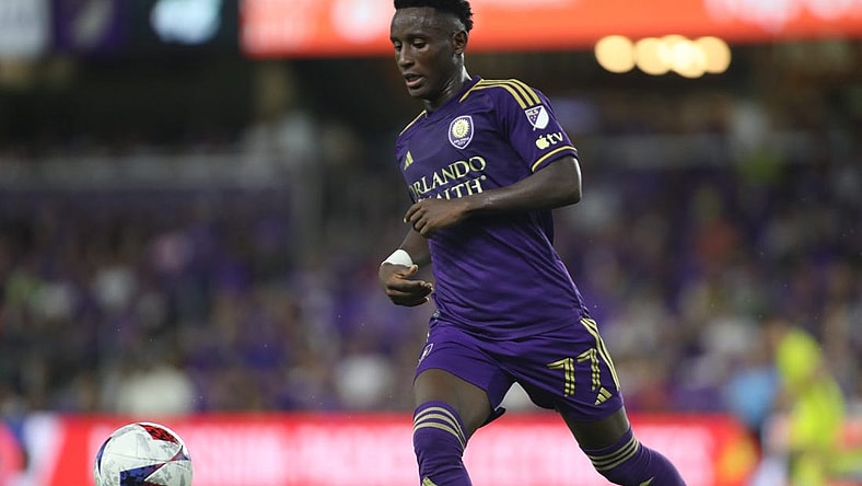 Oct 30, 2023; Orlando, Florida, USA; Orlando City forward Ivan Angulo (77) plays the ball in the second half against the Nashville SC of game one in a round one match of the 2023 MLS Cup Playoffs at Exploria Stadium. Mandatory Credit: Morgan Tencza-USA TODAY Sports