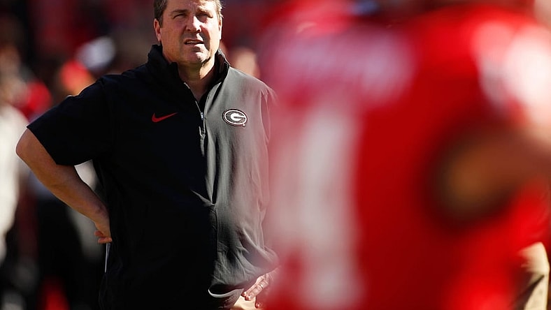 Georgia Co-Defensive Coordinator Will Muschamp looks on during warm ups before the start of a NCAA college football game against Missouri in Athens, Ga., on Saturday, Nov. 4, 2023.
