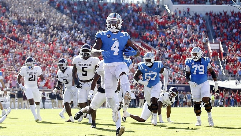 Nov 4, 2023; Oxford, Mississippi, USA; Mississippi Rebels running back Quinshon Judkins (4) runs the ball for a touchdown during the first half against the Texas A&M Aggies at Vaught-Hemingway Stadium. Mandatory Credit: Petre Thomas-USA TODAY Sports