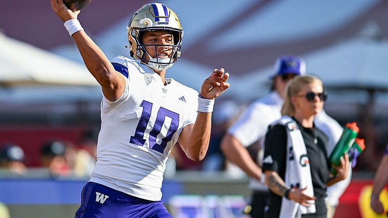 Nov 4, 2023; Los Angeles, California, USA; Washington Huskies quarterback Austin Mack (10) throws a pass against the USC Trojans during warmups at United Airlines Field at Los Angeles Memorial Coliseum. Mandatory Credit: Jonathan Hui-USA TODAY Sports