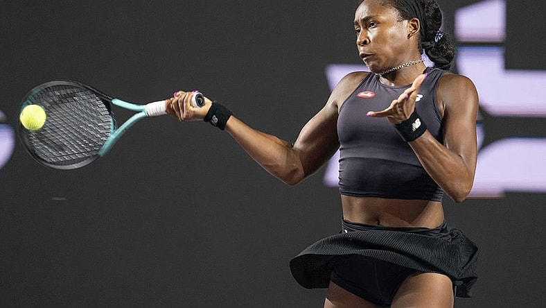 Nov 4, 2023; Cancun, Mexico; Coco Gauff (USA) returns a shot during her match against Jessica Pegula (USA) on day seven of the GNP Saguaros WTA Finals Cancun. Mandatory Credit: Susan Mullane-USA TODAY Sports