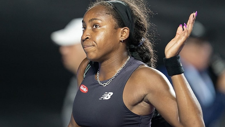 Nov 4, 2023; Cancun, Mexico; Coco Gauff (USA) waves as she leaves the court after her match against Jessica Pegula (USA) on day seven of the GNP Saguaros WTA Finals Cancun. Mandatory Credit: Susan Mullane-USA TODAY Sports