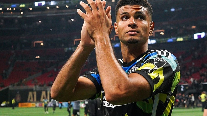 Nov 7, 2023; Atlanta, Georgia, USA; Atlanta United defender Miles Robinson (12) celebrates after defeating Columbus Crew at Mercedes-Benz Stadium. Mandatory Credit: Brett Davis -USA TODAY Sports