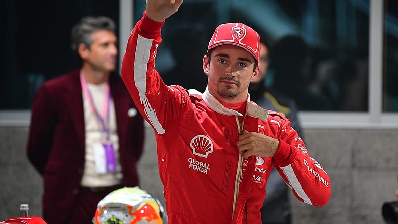 Nov 17, 2023; Las Vegas, Nevada, USA; Scuderia Ferrari driver Charles LeClerc of Monaco (16) celebrates after securing pole position during qualifying at Las Vegas Strip Circuit. Mandatory Credit: Gary A. Vasquez-USA TODAY Sports