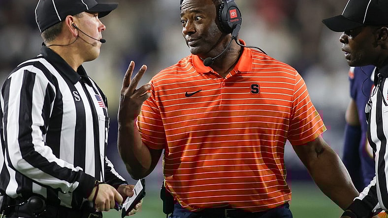 Nov 18, 2023; Atlanta, Georgia, USA; Syracuse Orange head coach Dino Babers talks to a referee against the Georgia Tech Yellow Jackets in the first half at Bobby Dodd Stadium at Hyundai Field. Mandatory Credit: Brett Davis-USA TODAY Sports