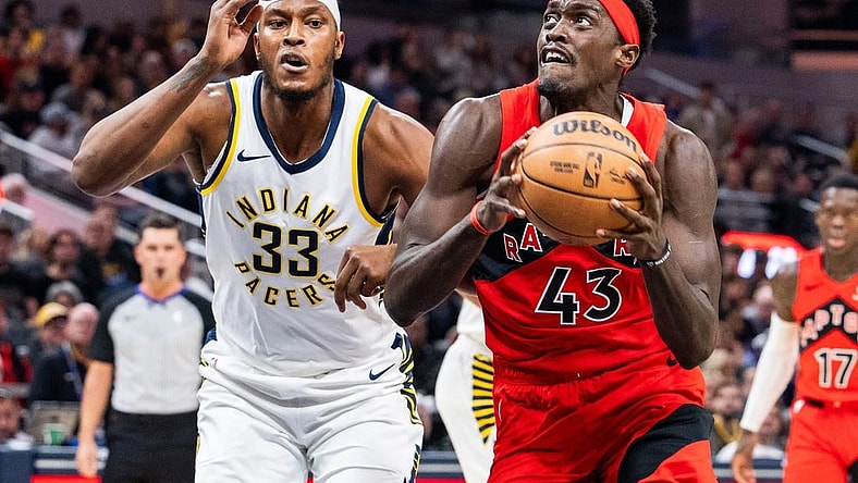 Nov 22, 2023; Indianapolis, Indiana, USA; Toronto Raptors forward Pascal Siakam (43) shoots the ball while Indiana Pacers center Myles Turner (33) defends in the first quarter at Gainbridge Fieldhouse. Mandatory Credit: Trevor Ruszkowski-USA TODAY Sports