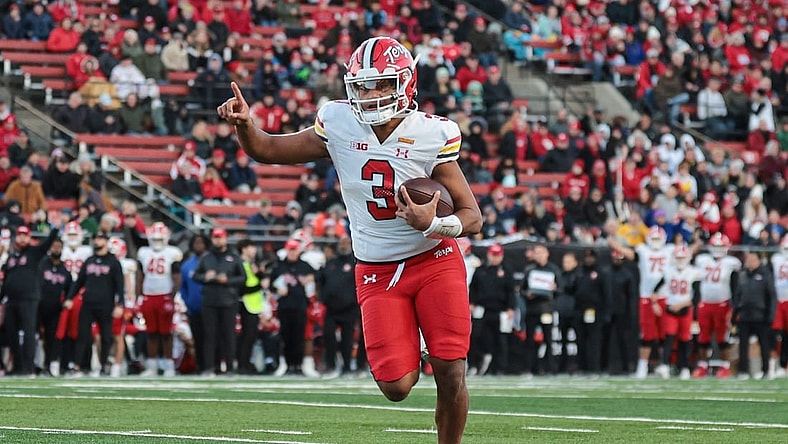 Nov 25, 2023; Piscataway, New Jersey, USA; Maryland Terrapins quarterback Taulia Tagovailoa (3) scores a rushing touchdown during the first half against the Rutgers Scarlet Knights at SHI Stadium. Mandatory Credit: Vincent Carchietta-USA TODAY Sports