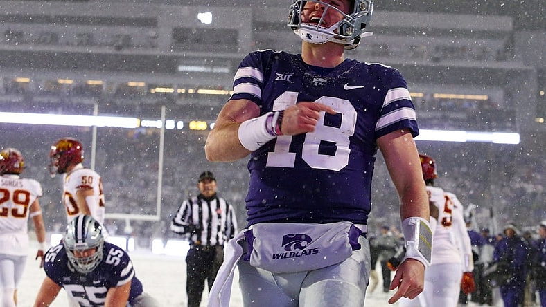 Nov 25, 2023; Manhattan, Kansas, USA; Kansas State Wildcats quarterback Will Howard (18) celebrates a touchdown in the third quarter against the Iowa State Cyclones at Bill Snyder Family Football Stadium. Mandatory Credit: Scott Sewell-USA TODAY Sports