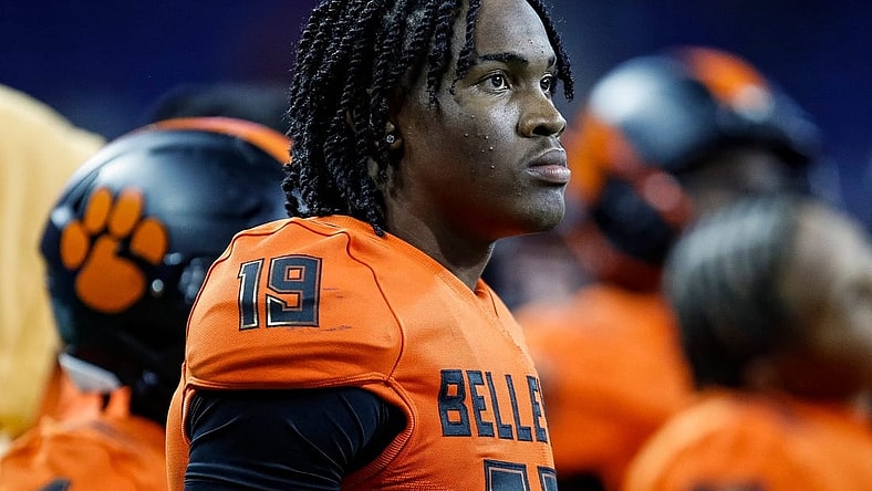 Belleville quarterback Bryce Underwood watches the last seconds of the game against Southfield A&T at the Division 1 state final at Ford Field in Detroit on Sunday, Nov. 26, 2023.