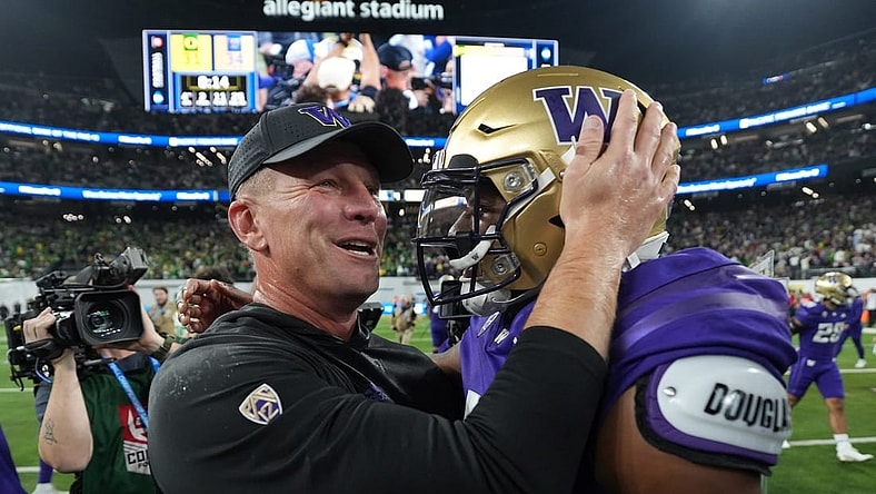 Dec 1, 2023; Las Vegas, NV, USA; Washington Huskies head coach Kalen DeBoer and quarterback Michael Penix Jr. (9) celebrate after the Pac-12 Championship game against the Oregon Ducks Allegiant Stadium. Mandatory Credit: Kirby Lee-USA TODAY Sports