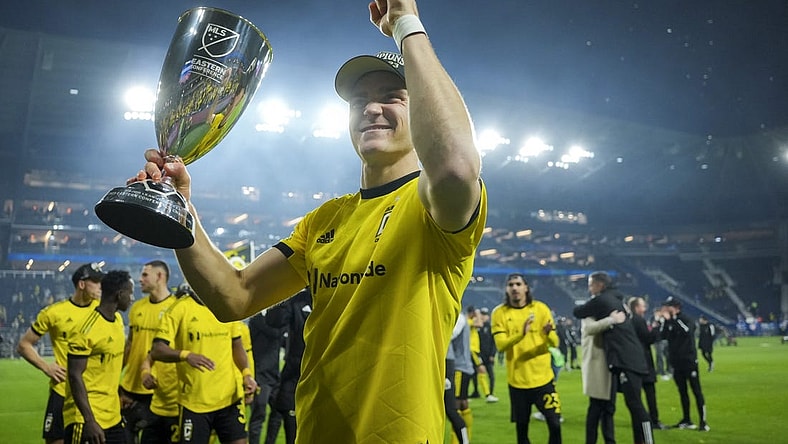 Dec 2, 2023; Cincinnati, Ohio, USA;  Columbus Crew defender Julian Gressel (7) celebrates with the trophy after defeating FC Cincinnati at TQL Stadium. Mandatory Credit: Aaron Doster-USA TODAY Sports