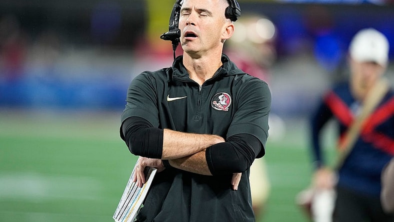Dec 2, 2023; Charlotte, NC, USA; Florida State Seminoles head coach Mike Norvell reacts on the sidelines during the second quarter against the Louisville Cardinalsat Bank of America Stadium. Mandatory Credit: Jim Dedmon-USA TODAY Sports