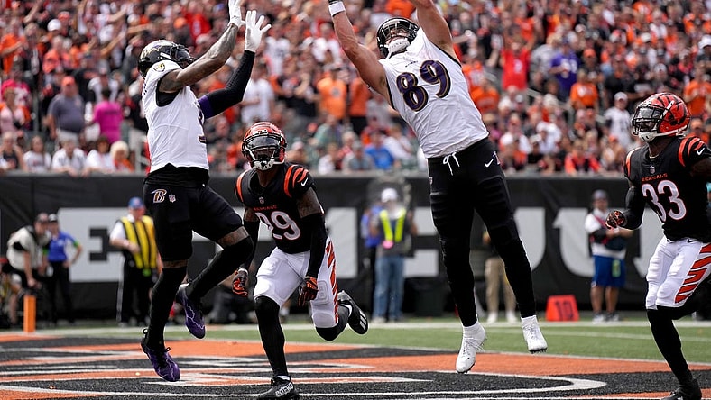 Baltimore Ravens tight end Mark Andrews (89) collects a pass in the end zone as Cincinnati Bengals cornerback Cam Taylor-Britt (29) defends in the second quarter of a Week 2 NFL football game between the Baltimore Ravens and the Cincinnati Bengals Sunday, Sept. 17, 2023, at Paycor Stadium in Cincinnati.