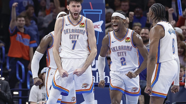 Dec 8, 2023; Oklahoma City, Oklahoma, USA; Oklahoma City Thunder forward Chet Holmgren (7), and guard Shai Gilgeous-Alexander (2) celebrate after Chet Holmgren scores a basket against the Golden State Warriors during the second half at Paycom Center. Mandatory Credit: Alonzo Adams-USA TODAY Sports