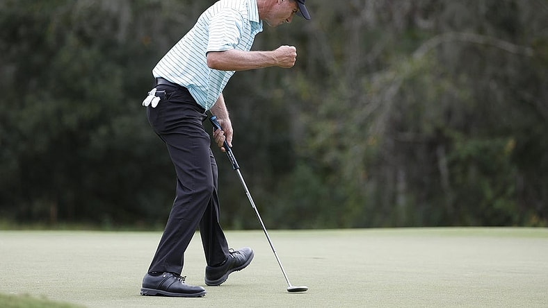 Dec 10, 2023; Bradenton, Florida, USA; Team International s Steven Alker reacts to an eagle putt on the eighth hole during their afternoon round at The Concession Golf Club. Mandatory Credit: Jeff Swinger-USA TODAY Sports