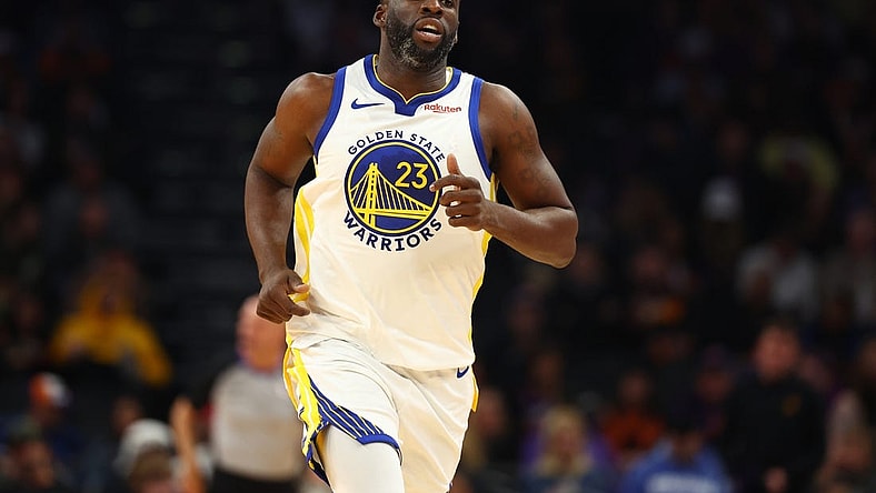 Dec 12, 2023; Phoenix, Arizona, USA; Golden State Warriors forward Draymond Green (23) against the Phoenix Suns at Footprint Center. Mandatory Credit: Mark J. Rebilas-USA TODAY Sports
