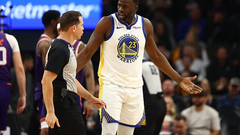 Dec 12, 2023; Phoenix, Arizona, USA; Golden State Warriors forward Draymond Green (23) reacts as he argues with an NBA referee against the Phoenix Suns at Footprint Center. Mandatory Credit: Mark J. Rebilas-USA TODAY Sports