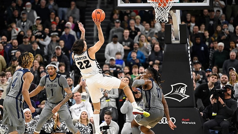 Dec 23, 2023; Providence, Rhode Island, USA; Providence Friars guard Devin Carter (22) shoots the ball against the Butler Bulldogs during overtime at Amica Mutual Pavilion. Mandatory Credit: Eric Canha-USA TODAY Sports
