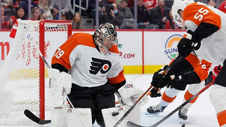 Dec 22, 2023; Detroit, Michigan, USA;  Philadelphia Flyers goaltender Carter Hart (79) makes a save in the second period against the Detroit Red Wings at Little Caesars Arena. Mandatory Credit: Rick Osentoski-USA TODAY Sports