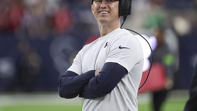 Dec 24, 2023; Houston, Texas, USA; Houston Texans offensive coordinator Bobby Slowik smiles before the game against the Cleveland Browns at NRG Stadium. Mandatory Credit: Troy Taormina-USA TODAY Sports