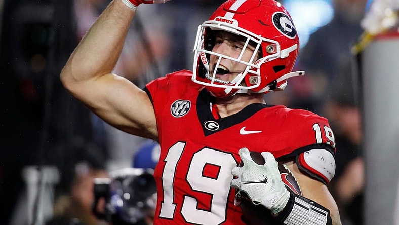 Georgia tight end Brock Bowers (19) celebrates after scoring a touchdown during the second half of a NCAA college football game against Ole Miss in Athens, Ga., on Saturday, Nov. 11, 2023. Georgia won 52-17.