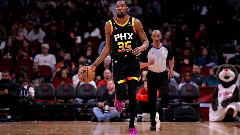 Dec 27, 2023; Houston, Texas, USA; Phoenix Suns forward Kevin Durant (35) handles the ball against the Houston Rockets during the third quarter at Toyota Center. Mandatory Credit: Erik Williams-USA TODAY Sports