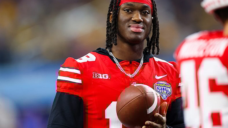 Dec 29, 2023; Arlington, TX, USA;  Ohio State Buckeyes wide receiver Marvin Harrison Jr. (18) looks on during the second half against the Missouri Tigers at AT&T Stadium. Mandatory Credit: Kevin Jairaj-USA TODAY Sports