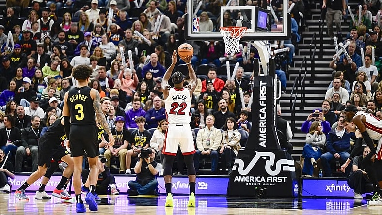 Dec 31, 2022; Salt Lake City, Utah, USA; Miami Heat forward Jimmy Butler (22) takes a free throw shot against the Utah Jazz during the second half at Vivint Arena. Mandatory Credit: Christopher Creveling-USA TODAY Sports