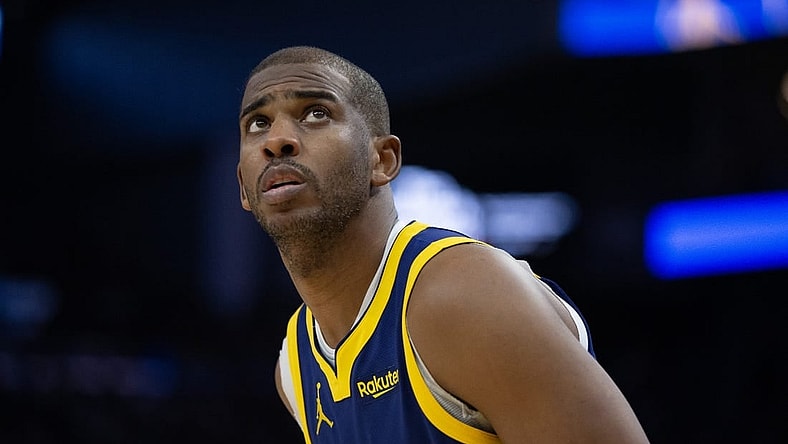 Dec 30, 2023; San Francisco, California, USA; Golden State Warriors guard Chris Paul (3) checks the scoreboard during the fourth quarter against the Dallas Mavericks at Chase Center. Mandatory Credit: D. Ross Cameron-USA TODAY Sports
