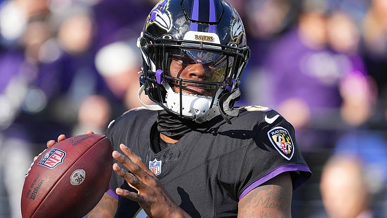 Dec 31, 2023; Baltimore, Maryland, USA; Baltimore Ravens  quarterback Lamar Jackson (8) warms up prior to the game against the Miami Dolphins at M&T Bank Stadium. Mandatory Credit: Mitch Stringer-USA TODAY Sports