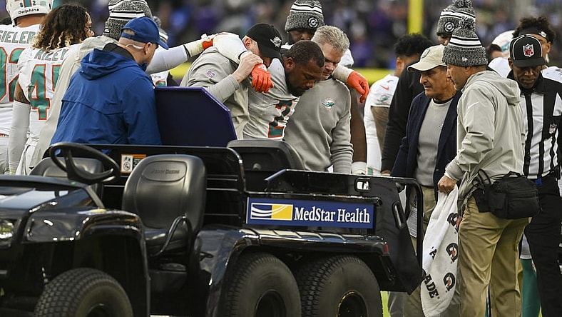 Dec 31, 2023; Baltimore, Maryland, USA;  Miami Dolphins linebacker Bradley Chubb (2) ins helped to the cart after being injured during the second  half against the Baltimore Ravens at M&T Bank Stadium.Baltimore Ravens defeated Miami Dolphins 56-19. Mandatory Credit: Tommy Gilligan-USA TODAY Sports