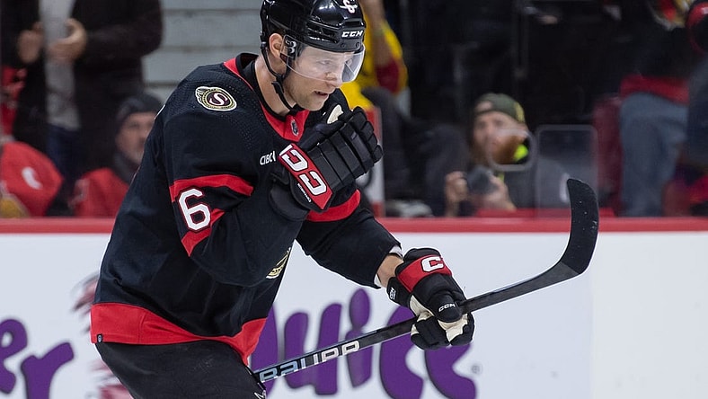 Dec 31, 2023; Ottawa, Ontario, CAN; Ottawa Senators defenseman Jakob Chychrun (6) skates to the bench after scoring a goal in the first period against the Buffalo Sabres at the Canadian Tire Centre. Mandatory Credit: Marc DesRosiers-USA TODAY Sports