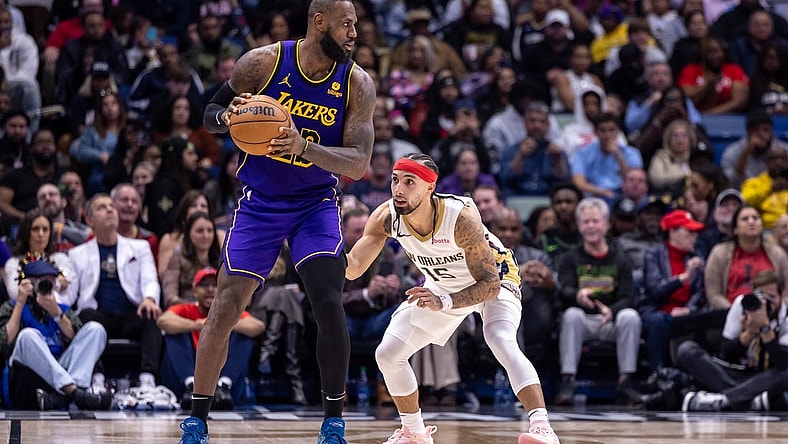 Dec 31, 2023; New Orleans, Louisiana, USA;  New Orleans Pelicans guard Jose Alvarado (15) guards Los Angeles Lakers forward LeBron James (23) during the second half at Smoothie King Center. Mandatory Credit: Stephen Lew-USA TODAY Sports
