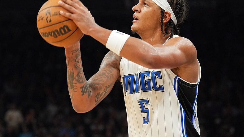 Dec 31, 2023; Phoenix, Arizona, USA; Orlando Magic forward Paolo Banchero (5) shoots against the Phoenix Suns during the second half at Footprint Center. Mandatory Credit: Joe Camporeale-USA TODAY Sports