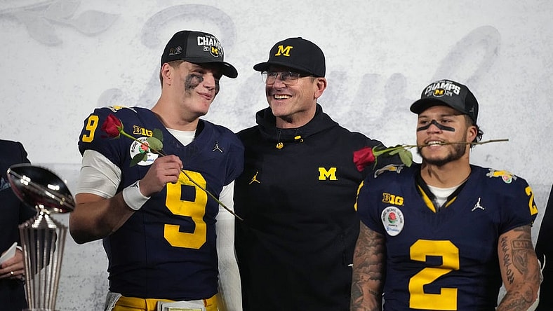 Jan 1, 2024; Pasadena, CA, USA; Michigan Wolverines head coach Jim Harbaugh (center) celebrates with quarterback J.J. McCarthy (9) and running back Blake Corum (2) after defeating the Alabama Crimson Tide in the 2024 Rose Bowl college football playoff semifinal game at Rose Bowl. Mandatory Credit: Kirby Lee-USA TODAY Sports