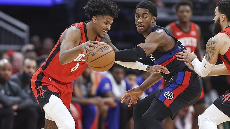 Jan 1, 2024; Houston, Texas, USA; Houston Rockets guard Jalen Green (4) controls the ball as Detroit Pistons guard Jaden Ivey (23) defends during the second quarter at Toyota Center. Mandatory Credit: Troy Taormina-USA TODAY Sports