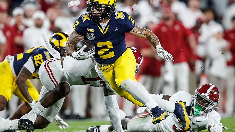 Michigan running back Blake Corum (2) runs against Alabama during the second half of the Rose Bowl in Pasadena, Calif., on Monday, Jan. 1, 2024.
