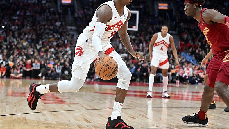 Jan 1, 2024; Toronto, Ontario, CAN;  Toronto Raptors forward RJ Barrett (9) dribbles the ball up court against the Cleveland Cavaliers in the second half at Scotiabank Arena. Mandatory Credit: Dan Hamilton-USA TODAY Sports