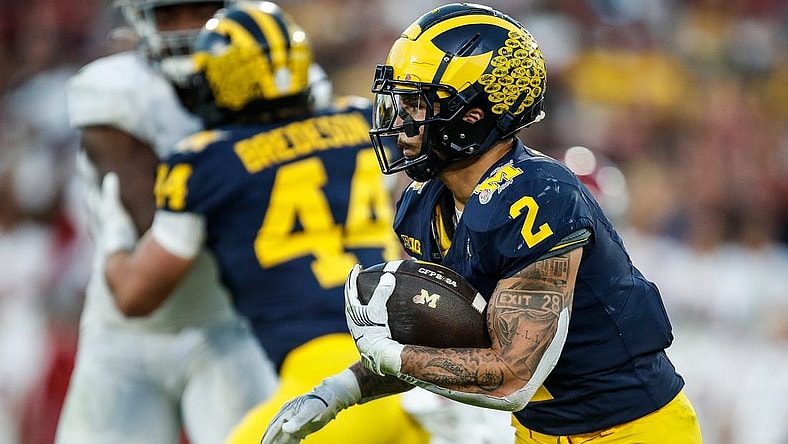 Michigan running back Blake Corum (2) runs against Alabama during the second half of the Rose Bowl in Pasadena, Calif., on Monday, Jan. 1, 2024.
