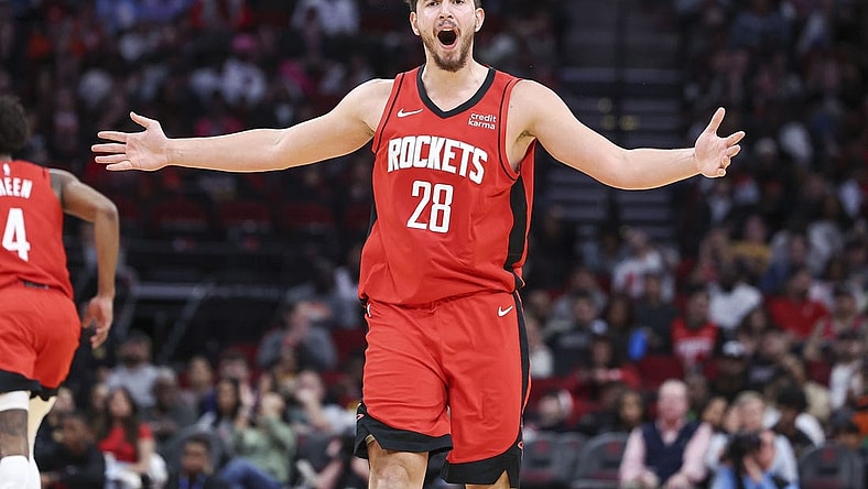 Jan 1, 2024; Houston, Texas, USA; Houston Rockets center Alperen Sengun (28) reacts after a play during the third quarter against the Detroit Pistons at Toyota Center. Mandatory Credit: Troy Taormina-USA TODAY Sports