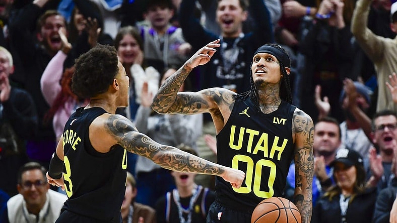 Jan 1, 2024; Salt Lake City, Utah, USA; Utah Jazz guard Jordan Clarkson (00) reacts after recovering a rebound for a record breaking triple-double against the Dallas Mavericks during the second half at the Delta Center. Mandatory Credit: Christopher Creveling-USA TODAY Sports