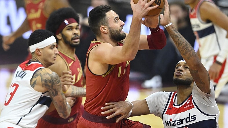 Jan 3, 2024; Cleveland, Ohio, USA; Cleveland Cavaliers guard Max Strus (1) drives against Washington Wizards center Daniel Gafford (21) in the first quarter at Rocket Mortgage FieldHouse. Mandatory Credit: David Richard-USA TODAY Sports