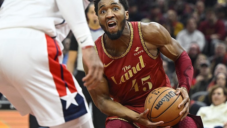 Jan 3, 2024; Cleveland, Ohio, USA; Cleveland Cavaliers guard Donovan Mitchell (45) drives to the basket in the second quarter against the Washington Wizards at Rocket Mortgage FieldHouse. Mandatory Credit: David Richard-USA TODAY Sports