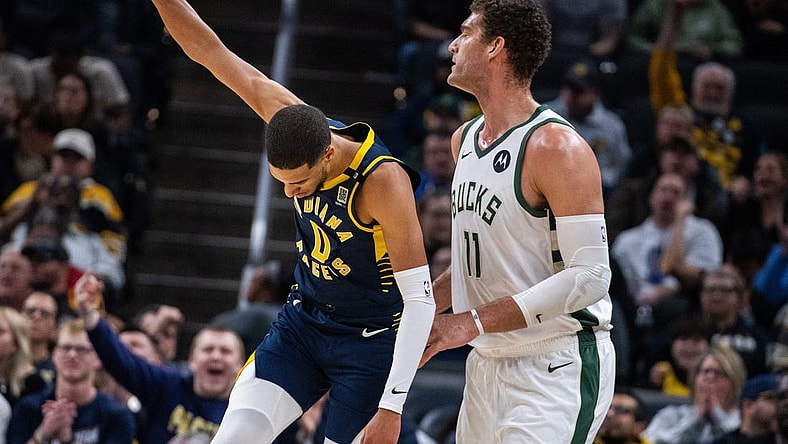 Jan 3, 2024; Indianapolis, Indiana, USA; Indiana Pacers guard Tyrese Haliburton (0) celebrates a made basket in the second quarter against the Milwaukee Bucks at Gainbridge Fieldhouse. Mandatory Credit: Trevor Ruszkowski-USA TODAY Sports