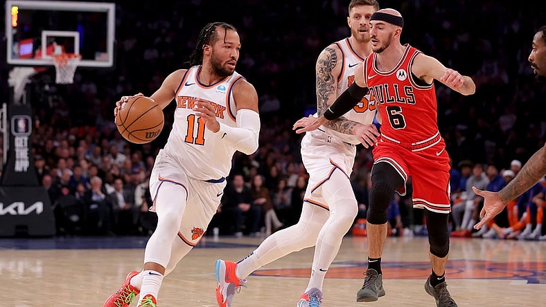 Jan 3, 2024; New York, New York, USA; New York Knicks guard Jalen Brunson (11) drives to the basket against Chicago Bulls guard Alex Caruso (6) during the first quarter at Madison Square Garden. Mandatory Credit: Brad Penner-USA TODAY Sports