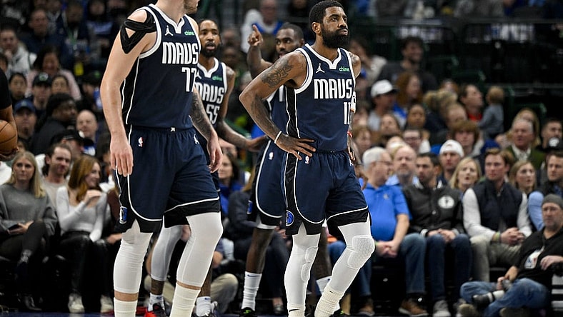 Jan 3, 2024; Dallas, Texas, USA; Dallas Mavericks guard Luka Doncic (77) and guard Kyrie Irving (11) walk back up the court during the first quarter against the Portland Trail Blazers at the American Airlines Center. Mandatory Credit: Jerome Miron-USA TODAY Sports